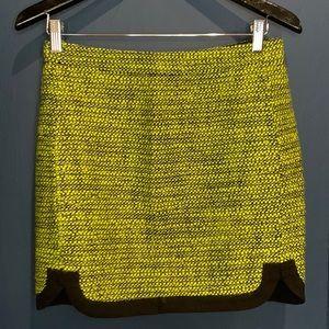 Neon green and black with sparkly thread throughout.